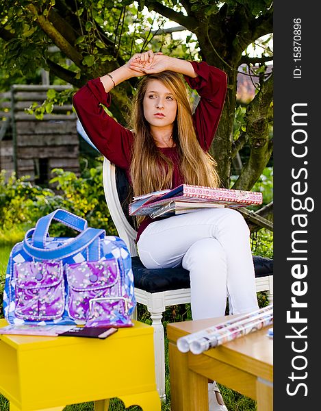 Back to school fashion showing bags, class books and accessories
