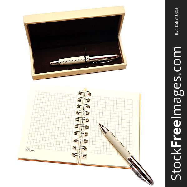 Open spiral notebook with case related to pen. Open spiral notebook with case related to pen