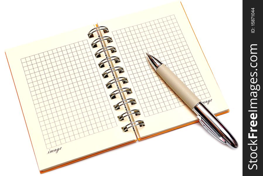Open spiral bound notebook with pen on white