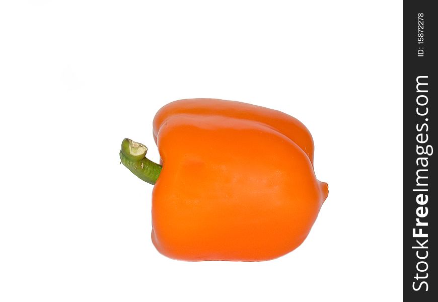 Excellent orange pepper with a green pod on a white background