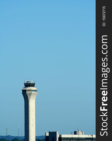 A Airport control tower with blue sky