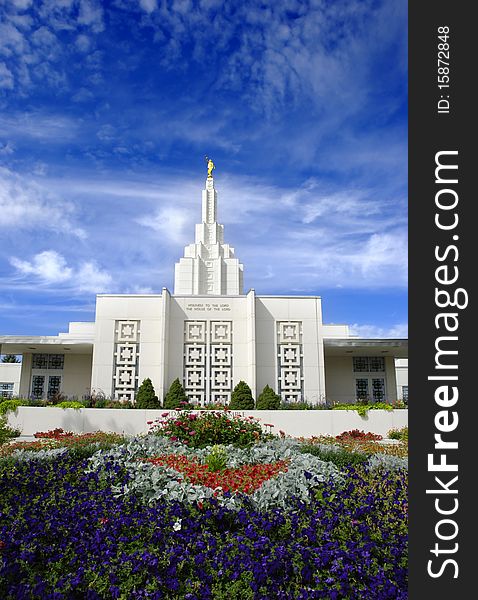 Mormon Temple with blue sky and clouds in background