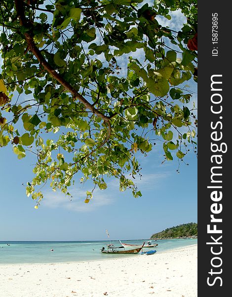 Longtail boat waiting at Koh Lepe , Andaman sea in Tarutao Marine National park , Thailand. Longtail boat waiting at Koh Lepe , Andaman sea in Tarutao Marine National park , Thailand