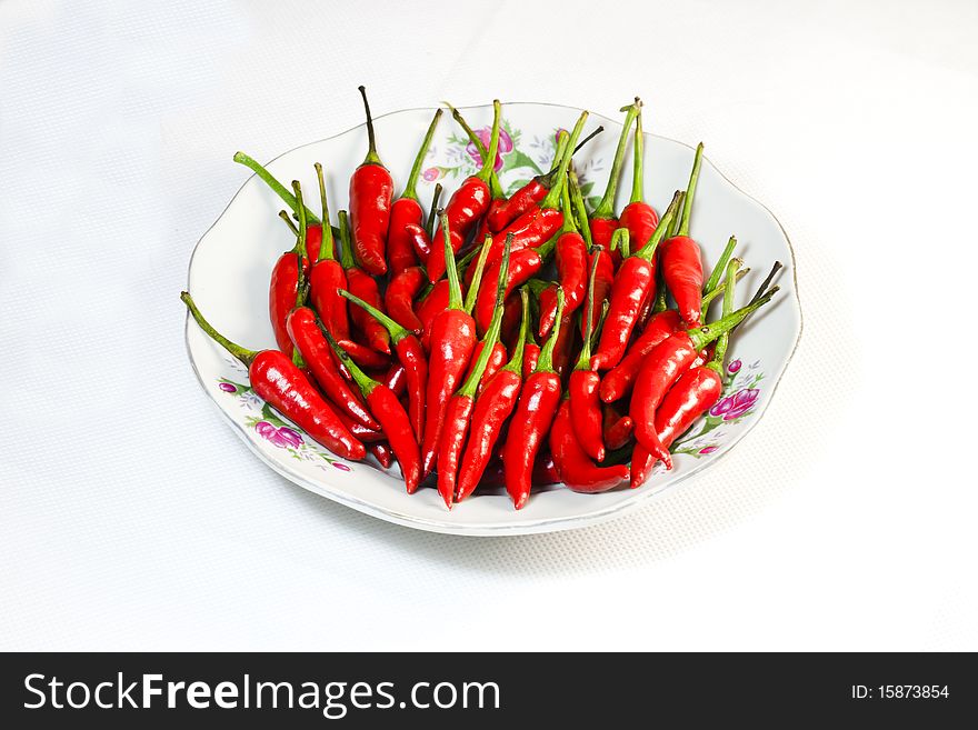 Red chili peppers in white background