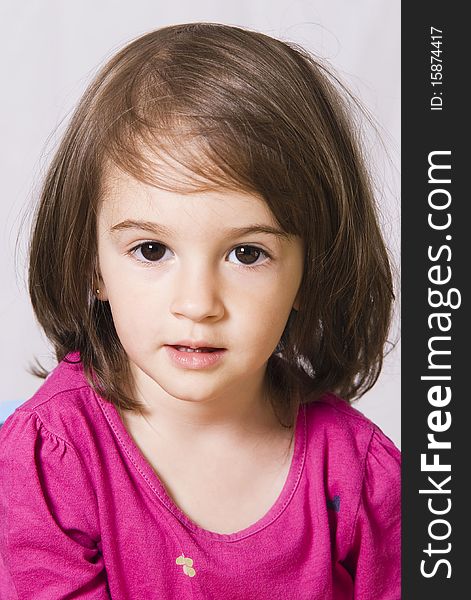 Portrait of a little girl in studio posing. Portrait of a little girl in studio posing