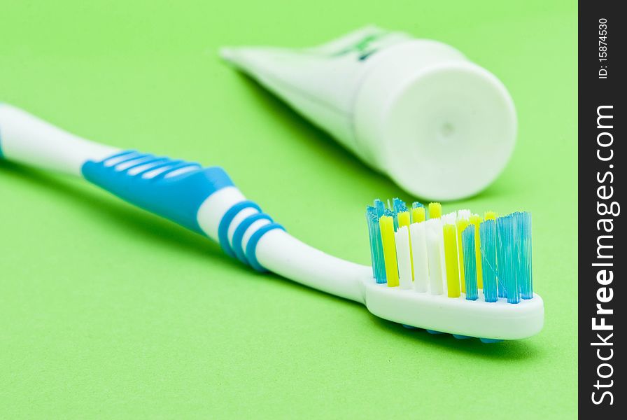 Colourful toothbrushes on the white background