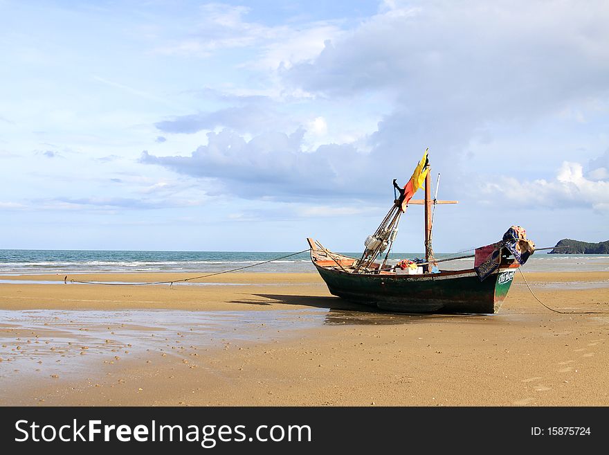 A long tail boat on the beach, Thailand