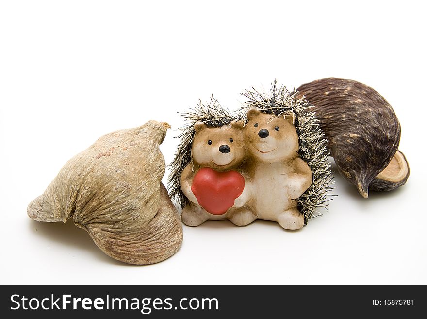 Hedgehog pair with heart and nutshell