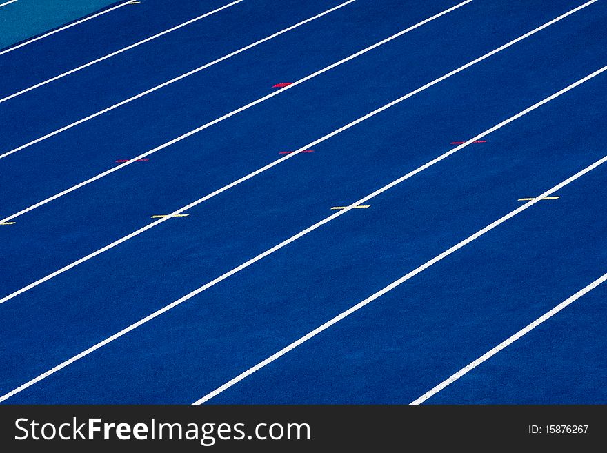 Lanes of a blue race track