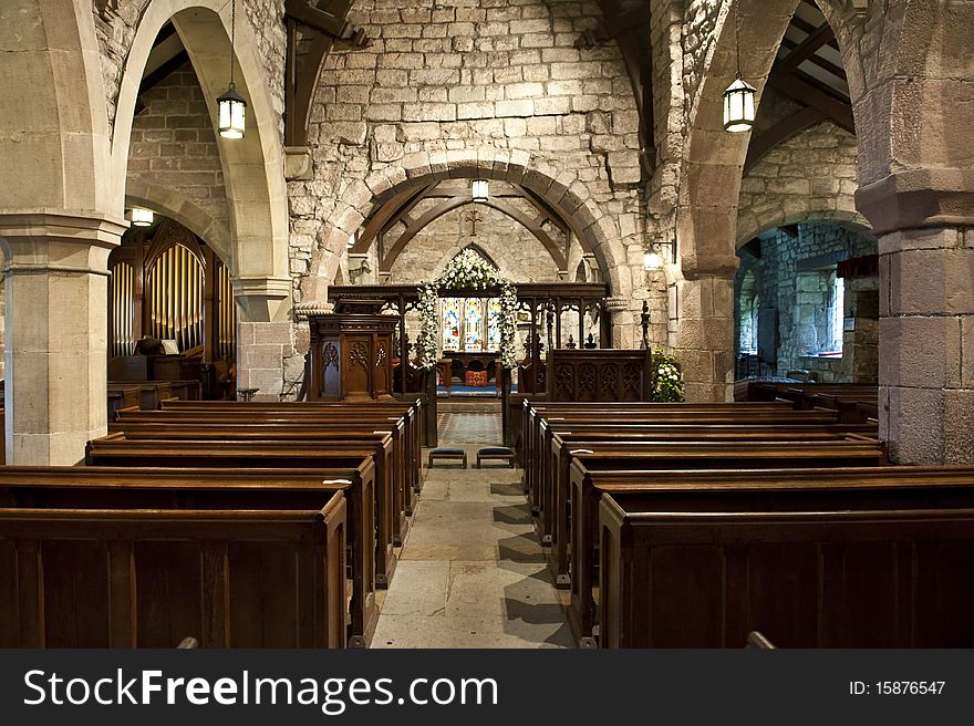 Church interior showing centre isle and pews