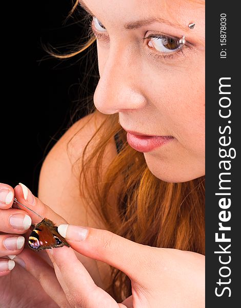 Portrait of beautiful redhaired woman closeup with butterfly. Portrait of beautiful redhaired woman closeup with butterfly