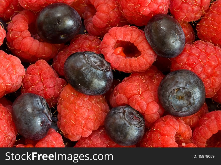 Blueberries and Raspberries on a pile