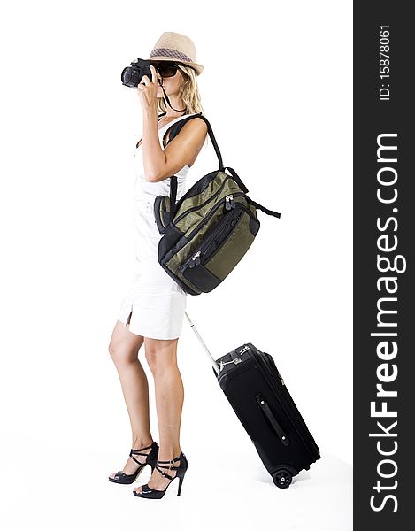 Woman traveling and taking pictures with her camera. Woman traveling and taking pictures with her camera