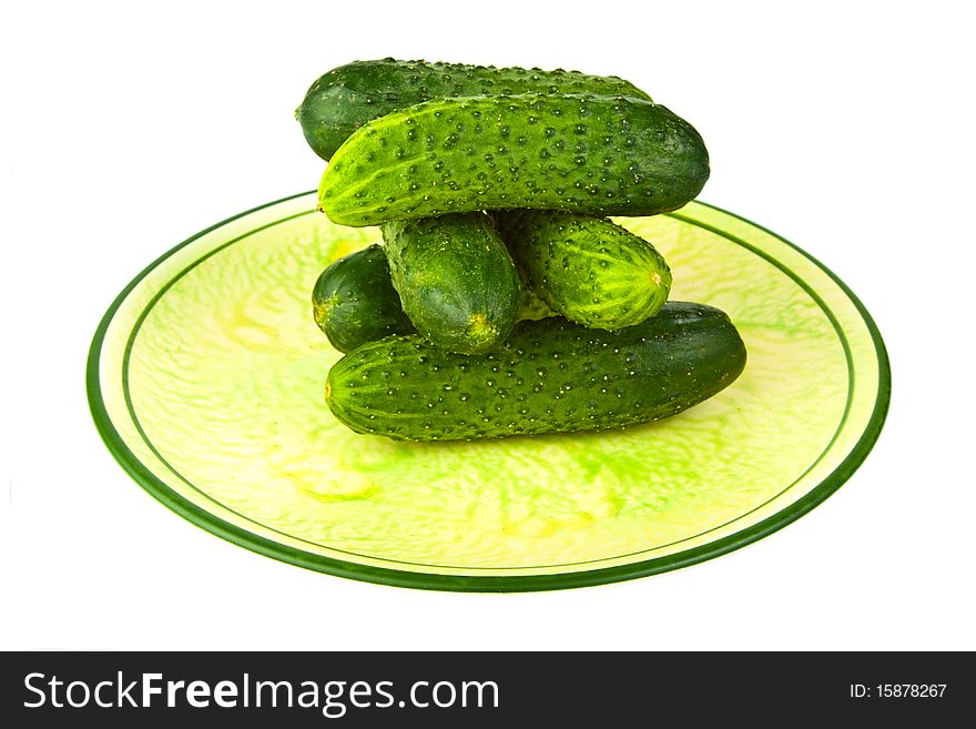 Cucumbers, piled on a plate. Cucumbers, piled on a plate
