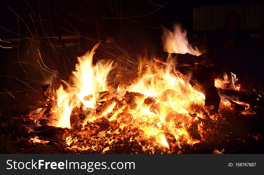 bonfire in backyard at night