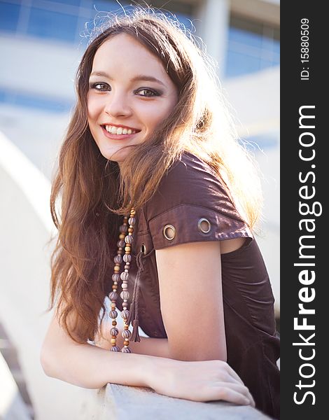 Portrait of a happy lovely young laughing girl wearing beads. Portrait of a happy lovely young laughing girl wearing beads