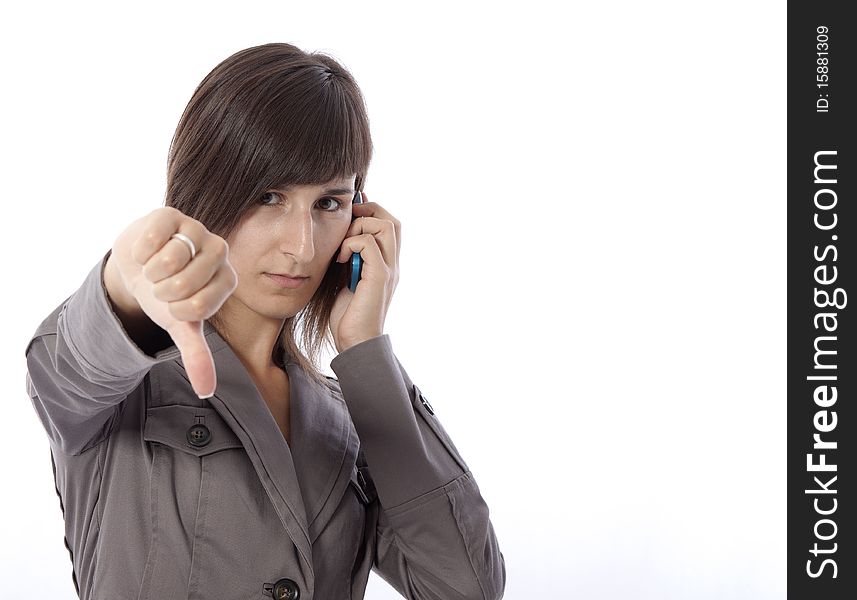 This photo shows a business woman talking on the phone.