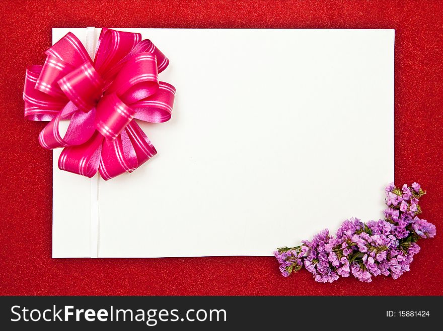 White paper blank on red with flowers design on red background. White paper blank on red with flowers design on red background