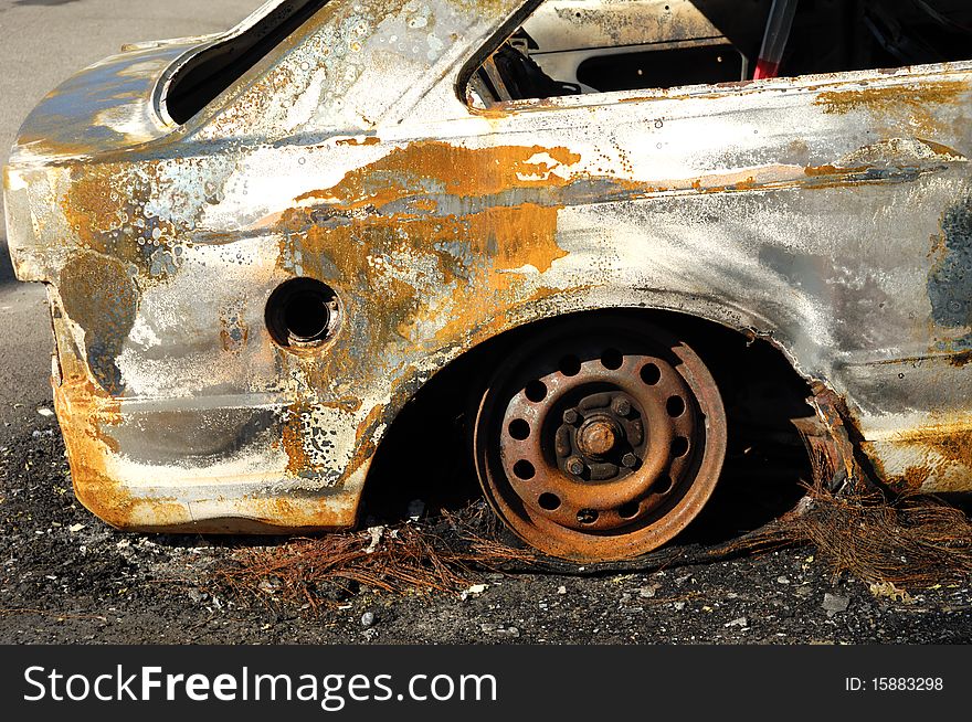 Rear end of a burnt out car. Rear end of a burnt out car