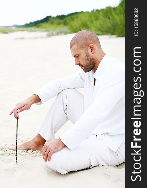 Attractive And Happy Man On Beach