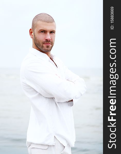 Attractive And Happy Man On Beach