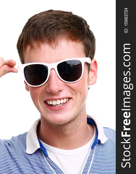 Young and attractive boy on white background