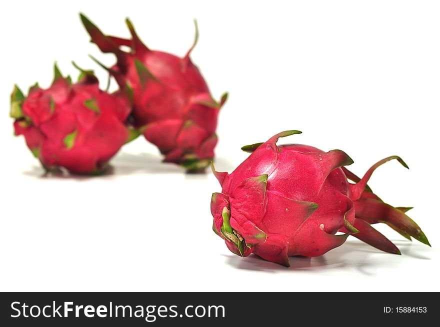 The fresh beautiful dragon fruits in the white background