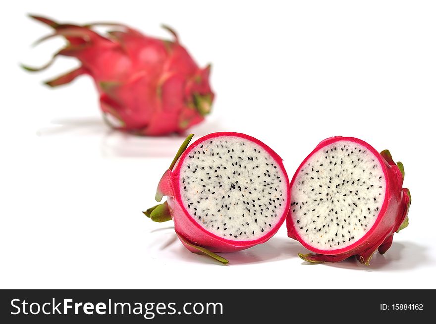 The fresh dragon fruit on the white background