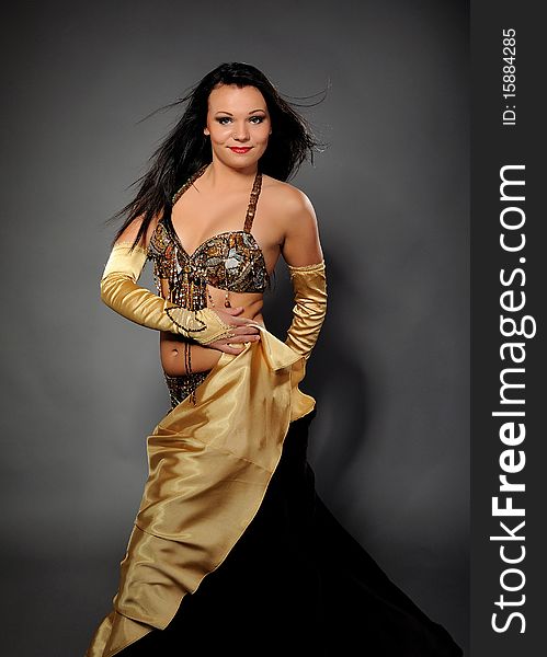 Beautiful dancer woman in bellydance costume
