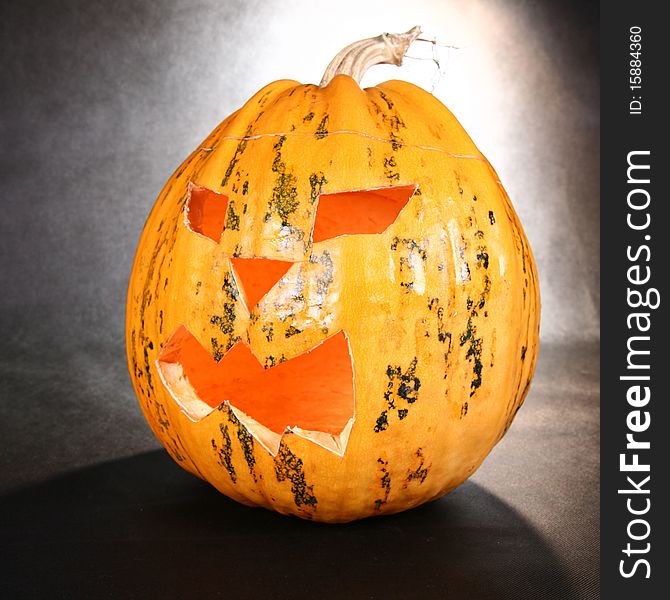 Illuminated Jack-o-lantern glowing on black background