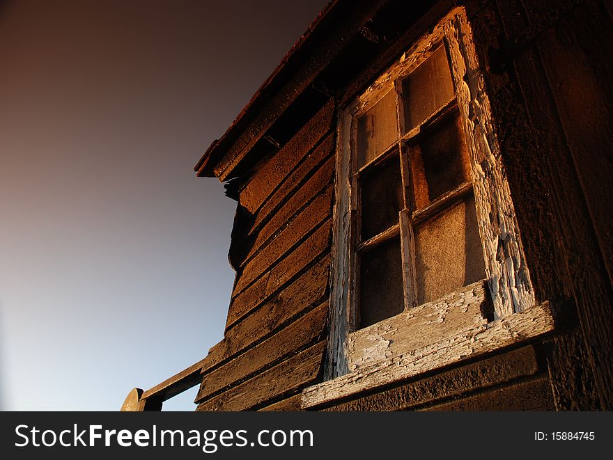 An image of an old rotting window in need of some tlc. An image of an old rotting window in need of some tlc