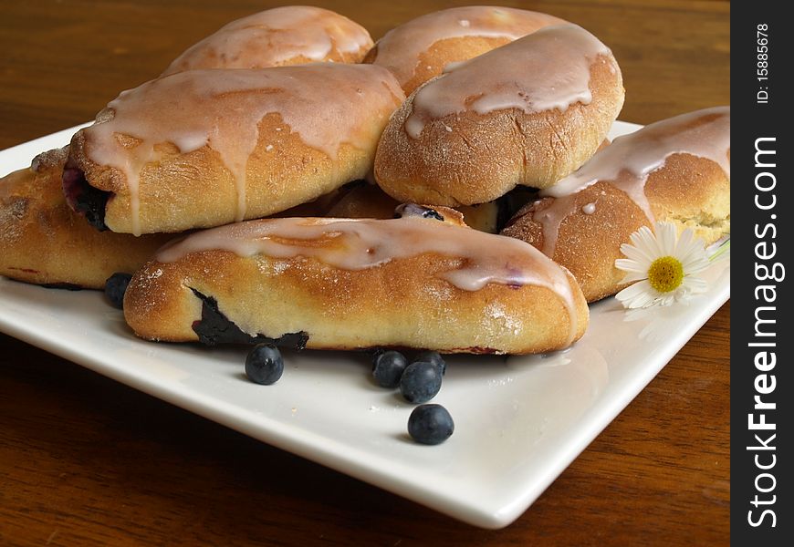 Sweet buuls withblueberries on a plate. Sweet buuls withblueberries on a plate