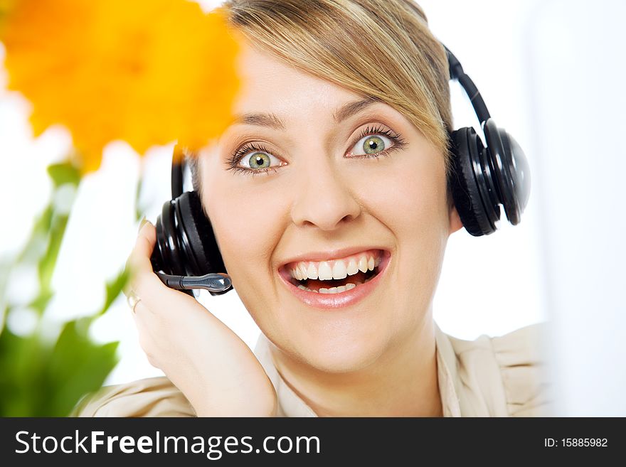 Portrait of beautiful smiling excited call center woman with headset. Portrait of beautiful smiling excited call center woman with headset