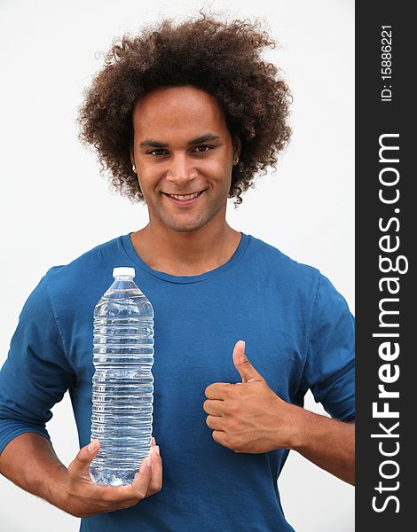 Closeup of man holding plastic bottle. Closeup of man holding plastic bottle