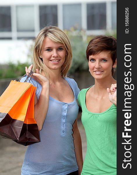 Young women with shopping bags. Young women with shopping bags