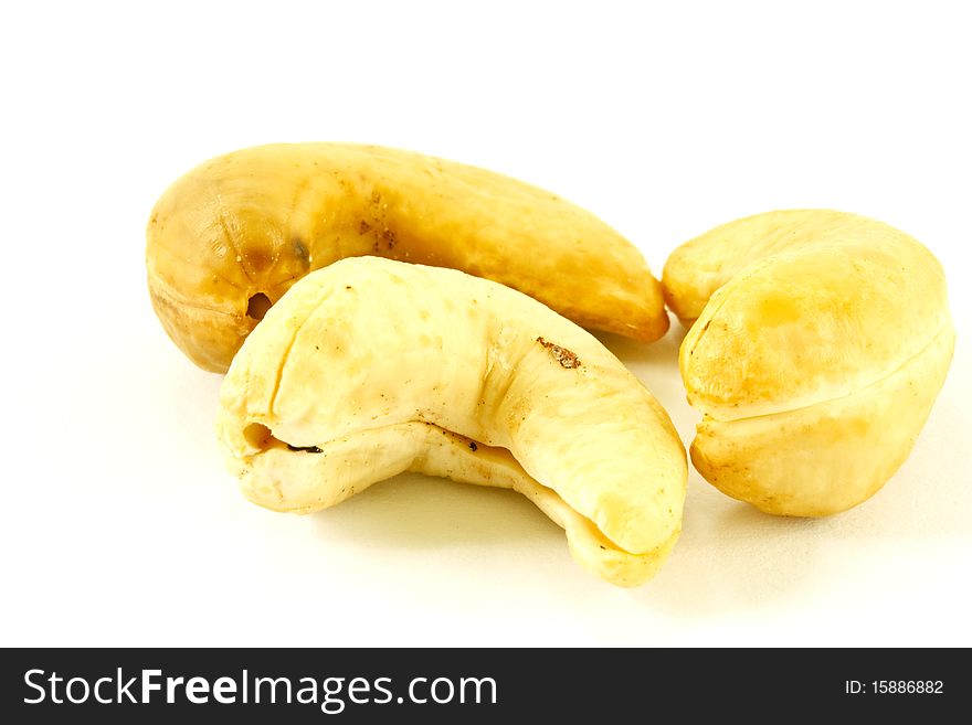 Cashew nuts closeup isolated on white background