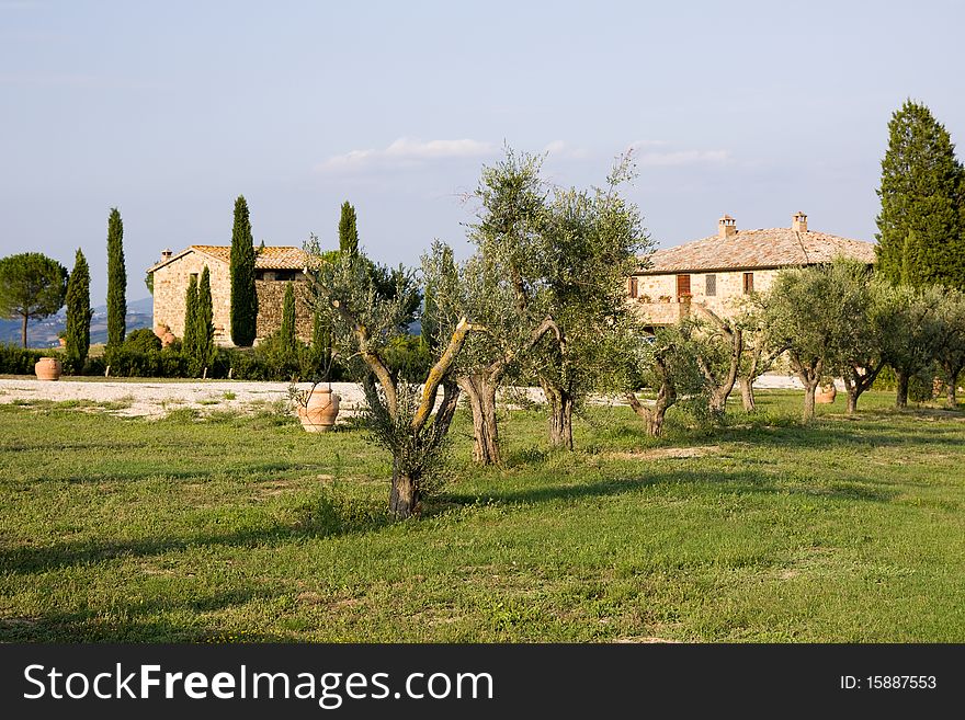 A typical mansion in a tuscany estate during the early autumn. A typical mansion in a tuscany estate during the early autumn