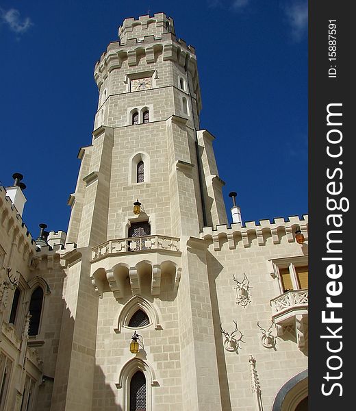 White decorated chateau tower with battlement. White decorated chateau tower with battlement.