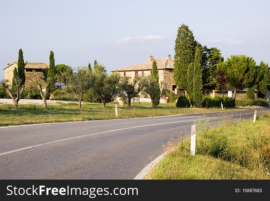 A typical mansion in a tuscany estate during the early autumn. A typical mansion in a tuscany estate during the early autumn