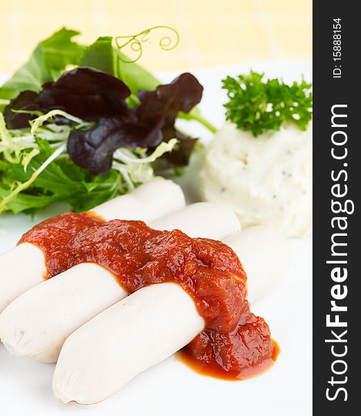 Pork Sausages With Tomato Sauce