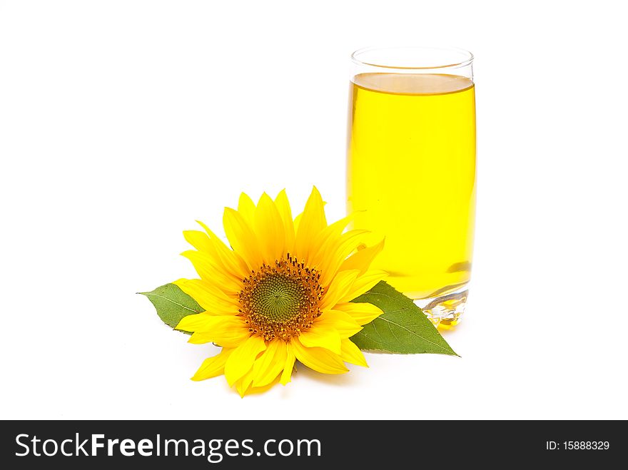 Sunflower oil and sunflower on white