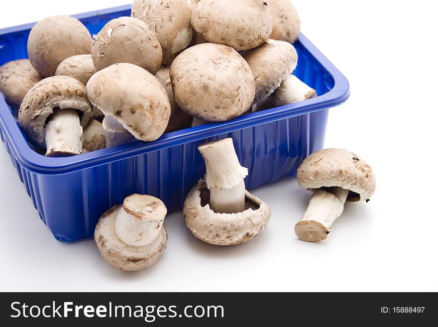 Champignon mushrooms in the packaging