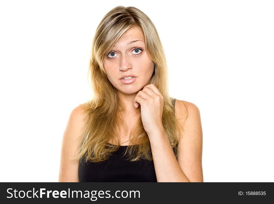 Close-up of a young woman looking surprised on white background