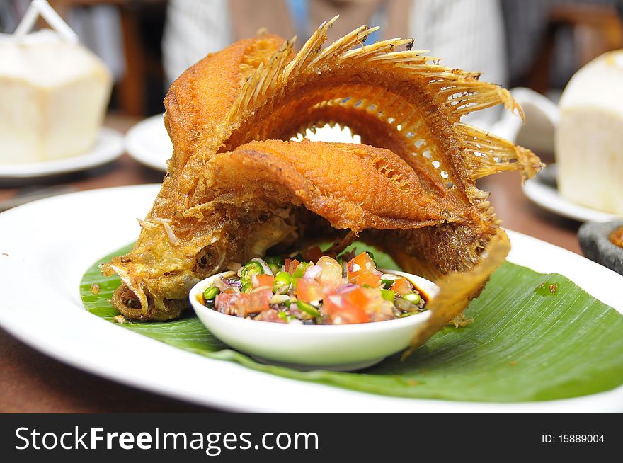 A fried fish served as adish at a Sundanese restaurant in KLCC. A fried fish served as adish at a Sundanese restaurant in KLCC