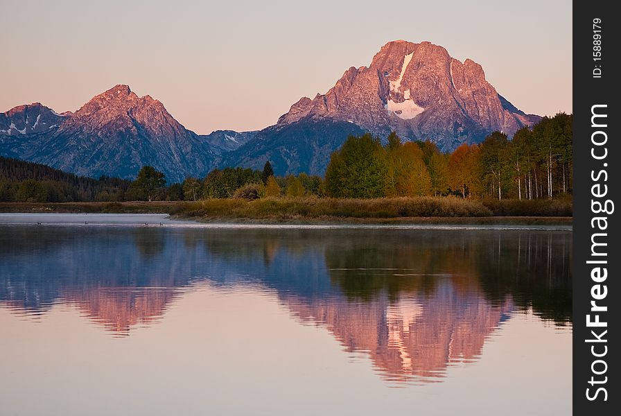 Early morning reflection of Mt. Moran at Oxbow Bend in Grand Teton National Park. Early morning reflection of Mt. Moran at Oxbow Bend in Grand Teton National Park.