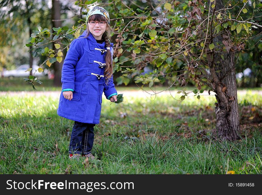 Nicelittle girl in blue coat