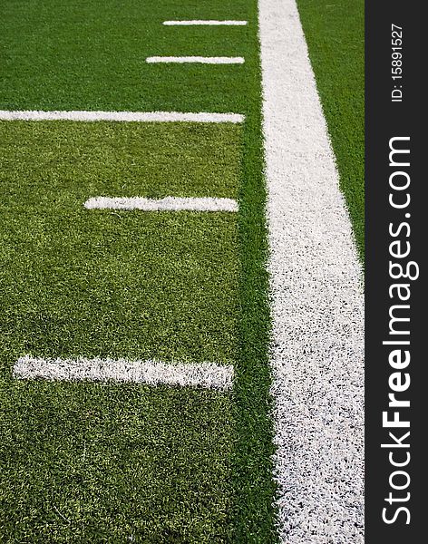 Football field sideline yard marks. Football field sideline yard marks