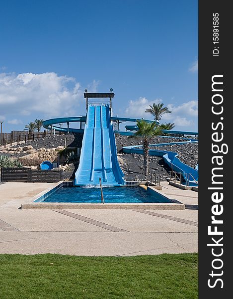 Water slide in the theme park .