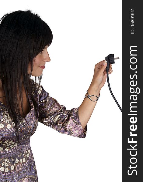 Woman Plugging Electric Cord. Side View.