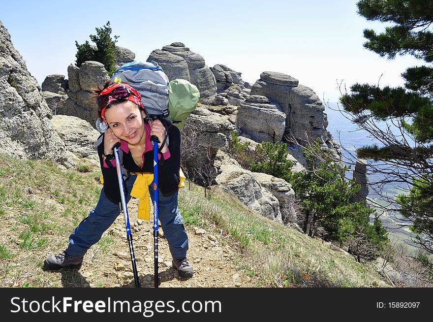 Woman tourist on top of mountains